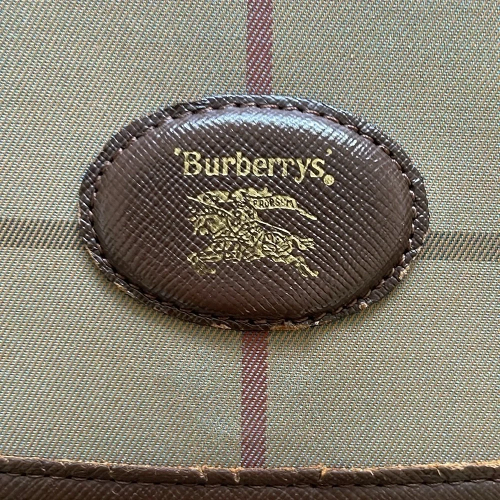 Burberry’s Vintage Beige Canvas Clutch Bag